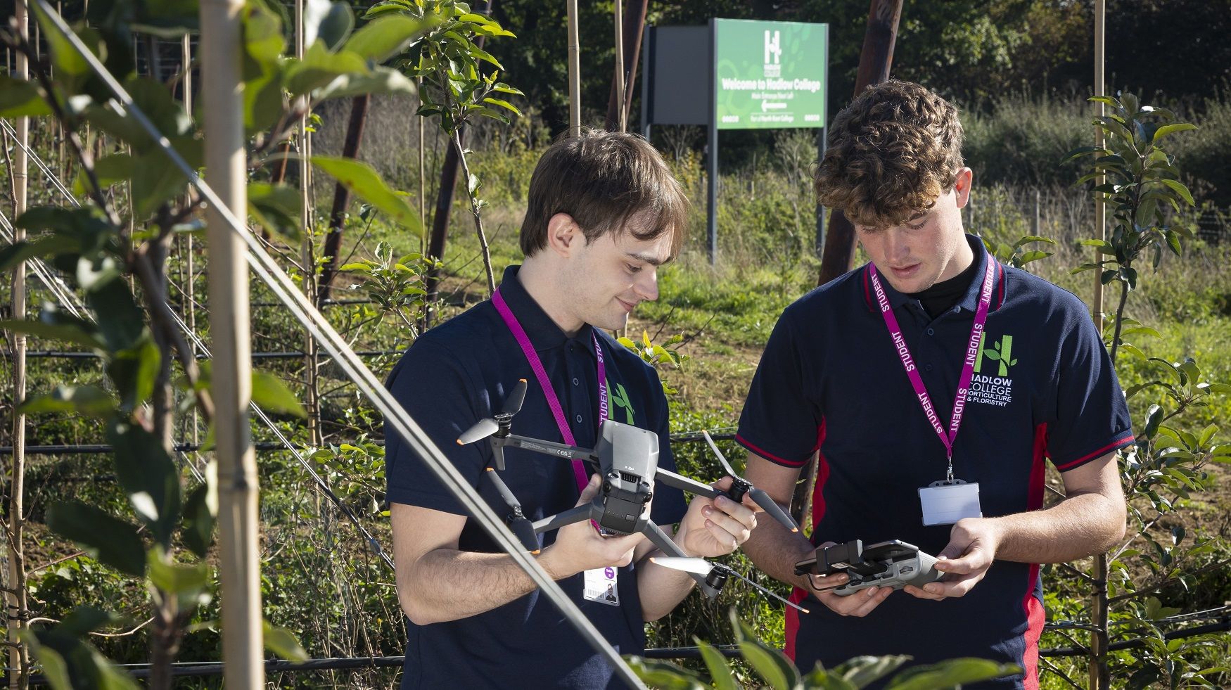 HAD Horticulture students with drone in orchard crop